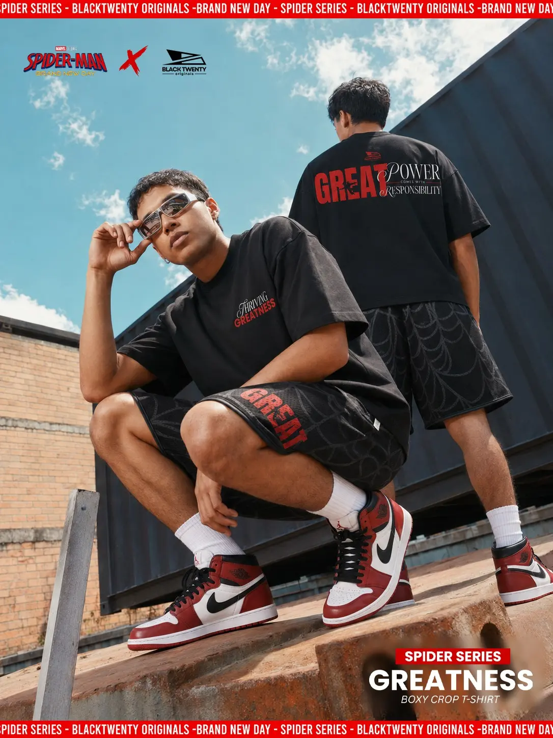 Models wearing the black Thriving for Greatness Spider Series collection